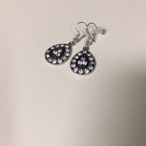 Brand new dangle statement earrings.